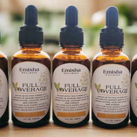 Meet our custom Full Coverage tincture which combines plant Beings that share wisdom on fighting cold & flu viruses, depression, anxiety and so much more. There are 5 brown glass tinctures pictured here that show the Emisha Wellness label which has both St. John's Wort and Lemon Balm pictures with a natural light background. Very pleasant on the eyes.