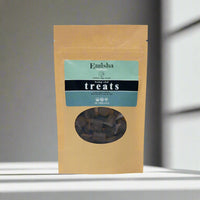 This pictures the largest size of Emisha CBD Dog Chews. The soft chews are visible and deliver 2.5 mg per chew for your dog. A tasty and functional morsel helping your dog's reduce inflammation, ease anxieties and even support arthritic conditions. The package is also lovely. A kraft bag with colors inspired by the Founder's travels through Morocco with a logo designed with beloved dogs, Zeus&Caesar