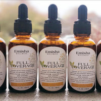 Meet our custom Full Coverage tincture which combines plant Beings that share wisdom on fighting cold & flu viruses, depression, anxiety and so much more. There are 5 brown glass tinctures pictured here that show the Emisha Wellness label which has both St. John's Wort and Lemon Balm pictures with a natural light background. Very pleasant on the eyes. 